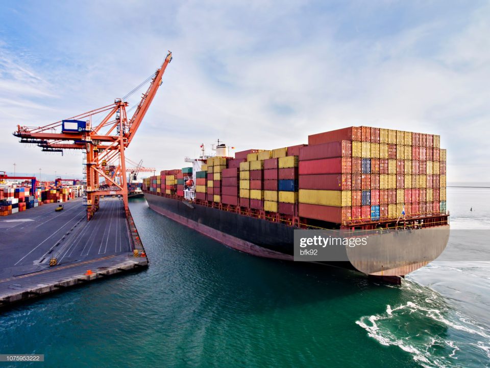 Aerial view of cargo ship in transit.