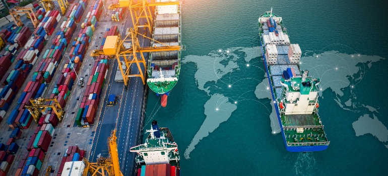 Aerial top view containers ship cargo business commercial trade logistic and transportation of international import export by container freight cargo ship on world map