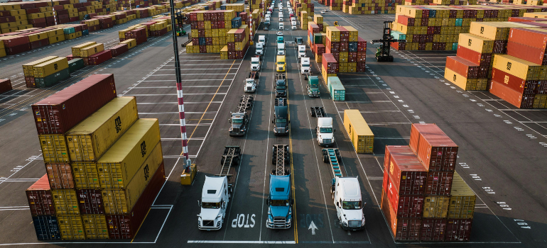 Trucks and cargo containers in the port