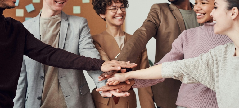 People in the office smiling.