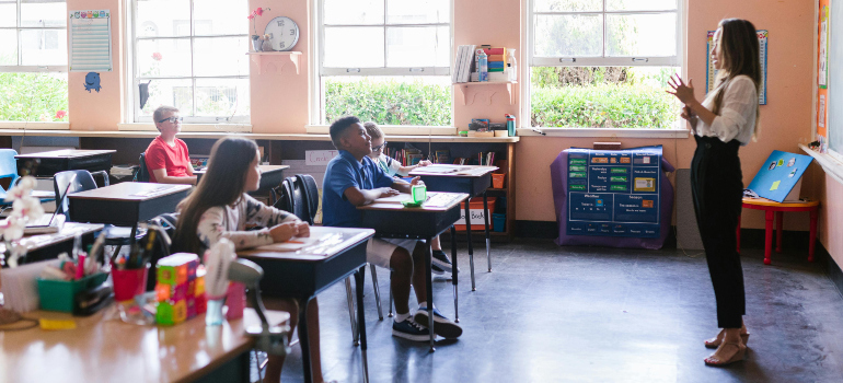 students and teacher in a classroom