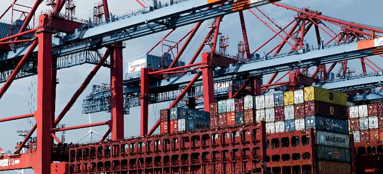 Industrial Harbor Port with Cranes and Shipping Containers showcasing the importance of cargo stowage