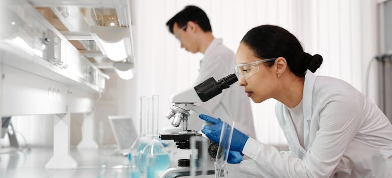 Woman Using the Microscope