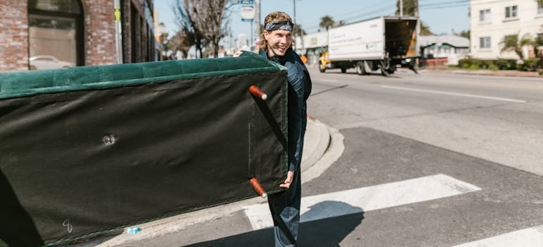 a man moving large or delicate items safely