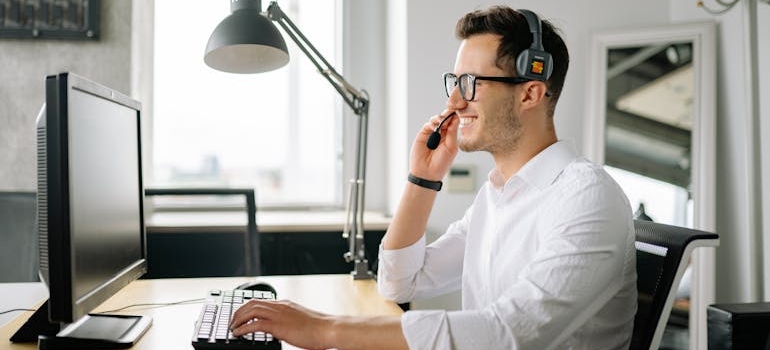 Man working in a customer support center.