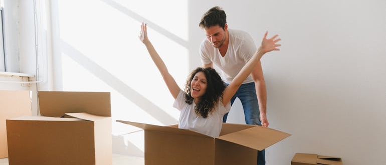 a happy couple ready to move with Germantown movers 