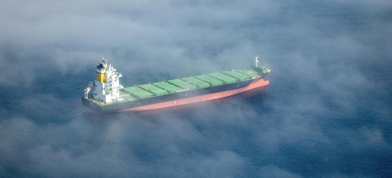 a ship in the sea representing how conflicts impact movement along key global trade routes