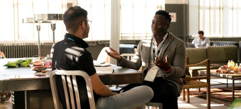 Two men having a conversation.