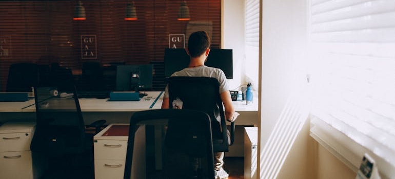 a person behind a desk working 