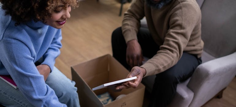 a couple packing and wondering how to handle moving day for long-distance relocations effectively.