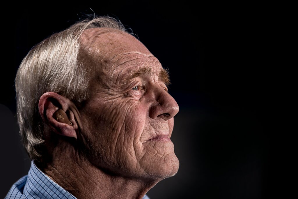 Smiling senior man preparing for a move