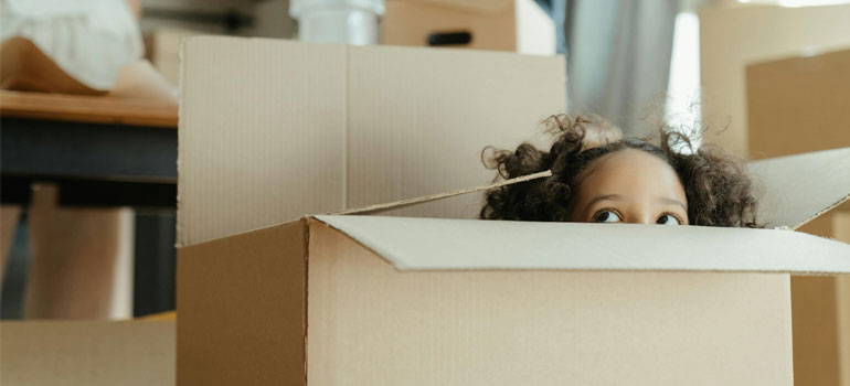 a child in a moving box